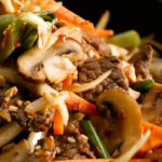 Ginger beef stir fry recipe made with fresh sliced mushrooms from South Mill Champs